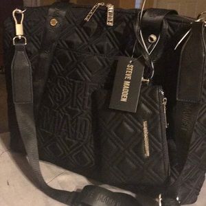 NWT Steve Madden Luggage with zipper wristlet.